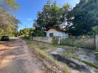 Quiet road with cottage and mature trees by lot for sale in Coronado Panama