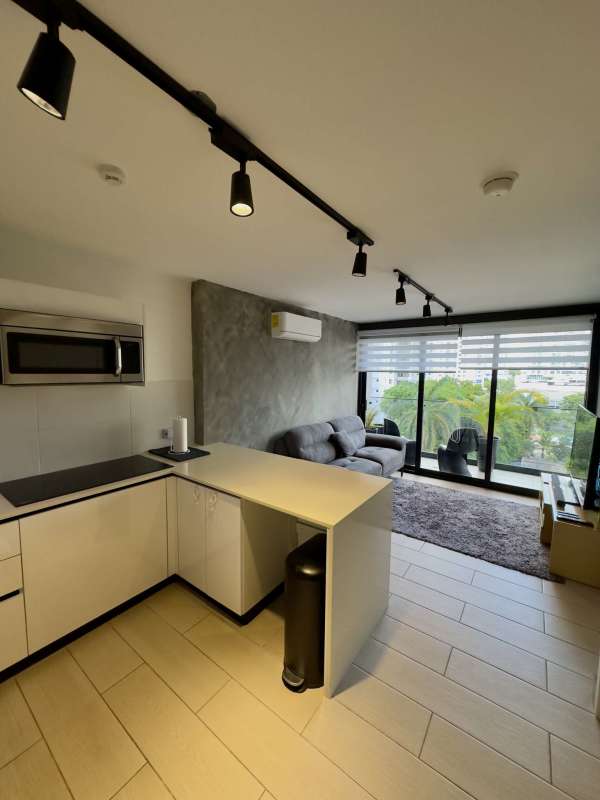 Skyline infinity pool with skyline sunset views Living73 San Francisco Panama Condo