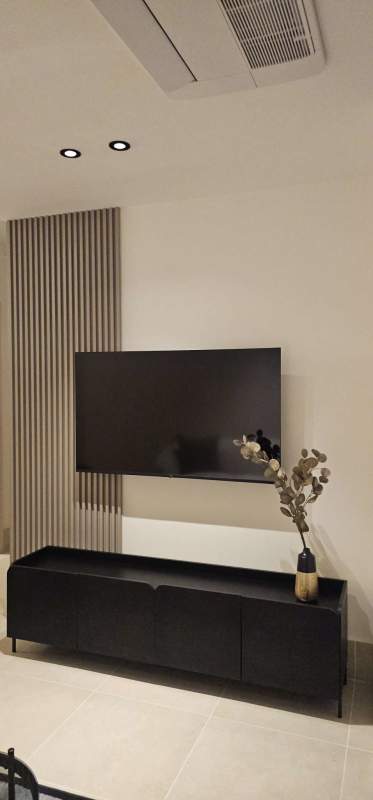 Open concept kitchen with quartz countertops in luxury Santa Maria Panama apartment