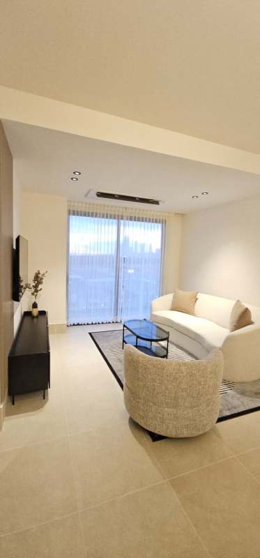 Contemporary bathroom with glass shower in luxury Santa Maria apartment Panama