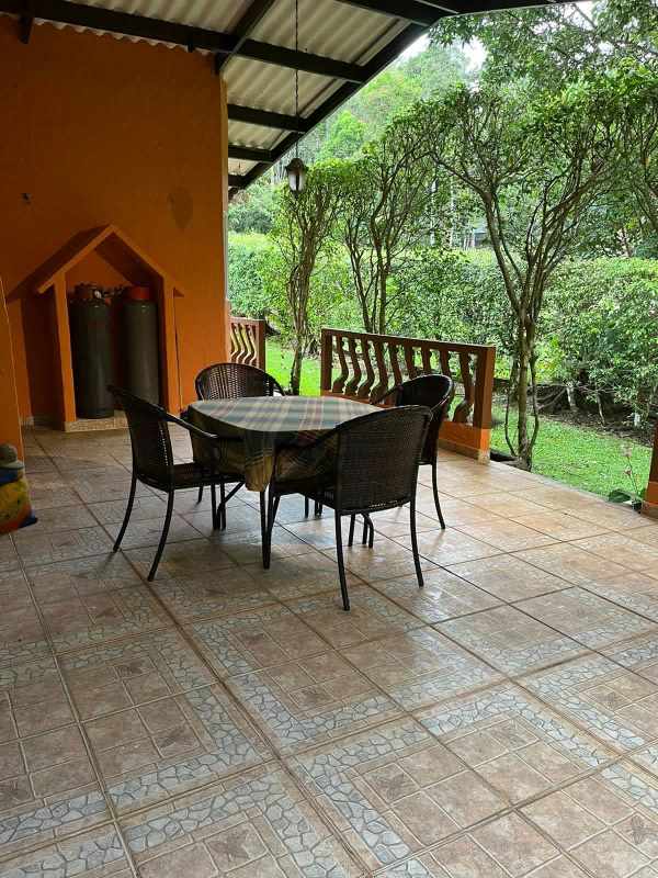 Covered patio with dining space overlooking garden mountain retreat Panama
