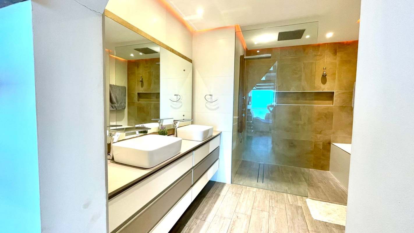 Open kitchen with modern cabinetry and appliances in PH Destiny Panama City