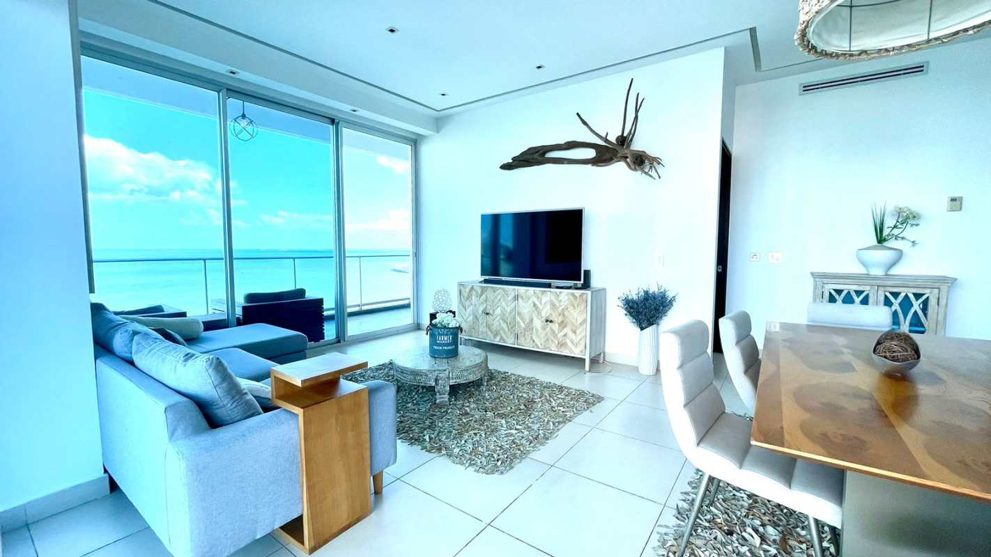 Open living dining area with panoramic ocean views at PH Destiny Avenida Balboa