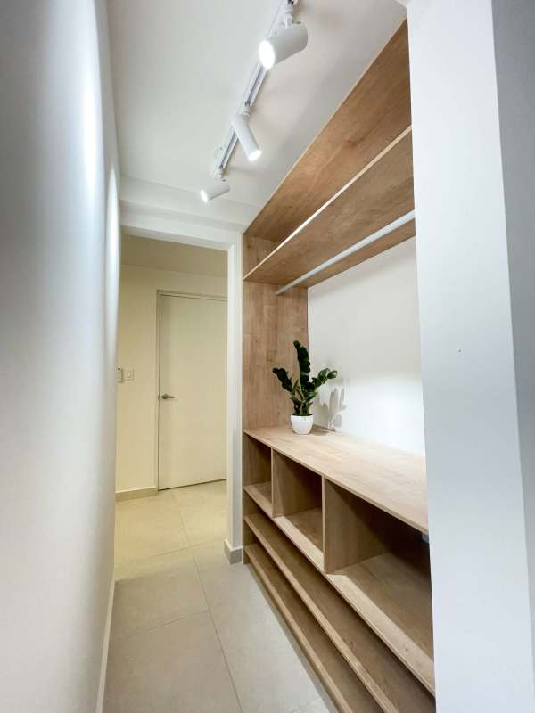 Custom built-in closet space with shelving at PH Costana apartments near Cinta Costera Panama City