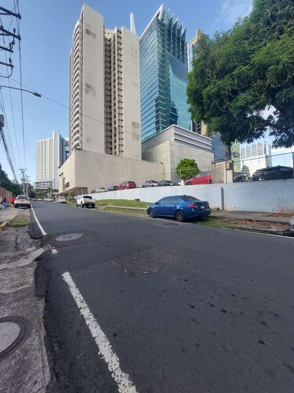 Long corridor with recessed lights, glass doors, wood-look flooring Obarrio Panama