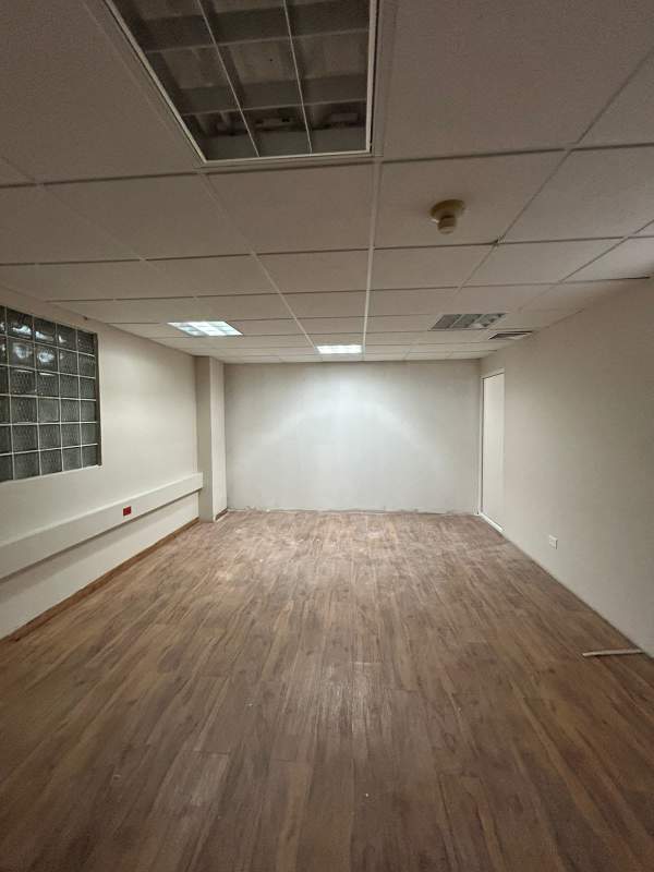 Marble elevator lobby with two elevators and decorative wall accents Obarrio Panama