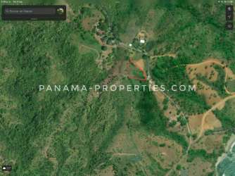 Aerial image of Puerto Escondido luxury land plot with forest and oceanfront proximity Pedasí Panama