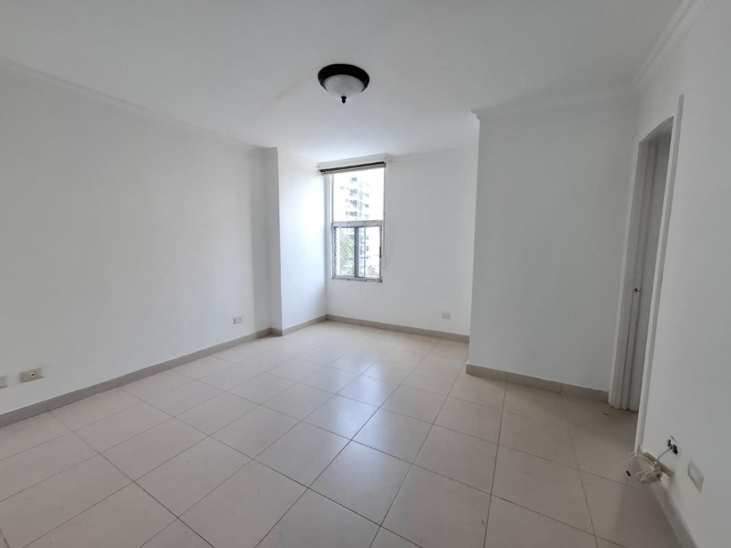 Large bedroom with natural light, ceramic floors, view to Panama skyline Tao Tower