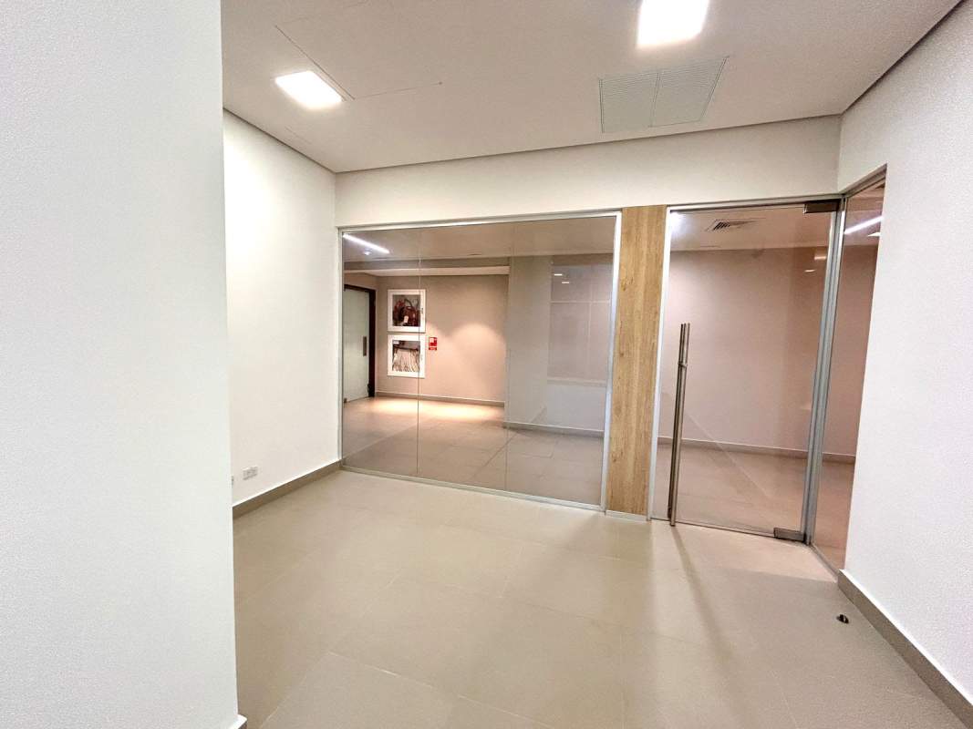 Bright office with full length windows overlooking mall interior in Town Center Costa del Este