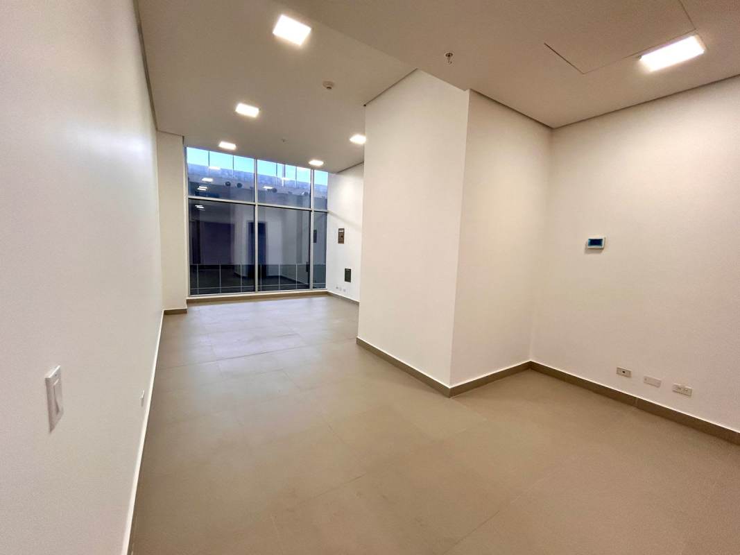 Exterior modern towers view with green areas surrounding Costa del Este Town Center