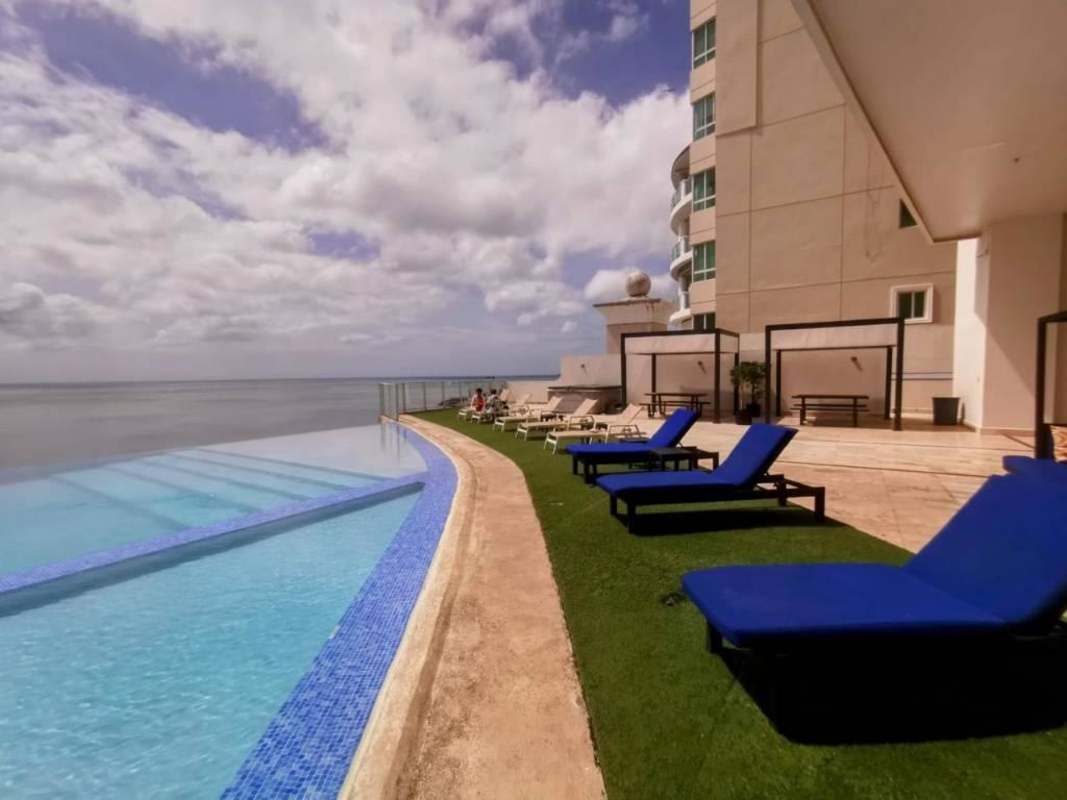 Terrace lounge with panoramic ocean views and pool at PH Oasis Punta Pacifica