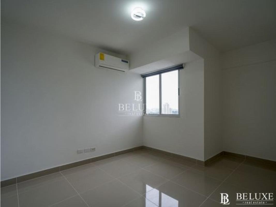 Elegant entrance lobby with lounge seating, double height ceiling at PH Residencias del Sol Panama