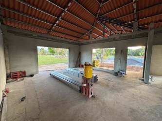 Red tiled gabled roof on villa under construction PH La Colonia Coronado Panama