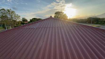 Spacious unfinished living area with exposed beams in La Colonia villa Coronado Panama