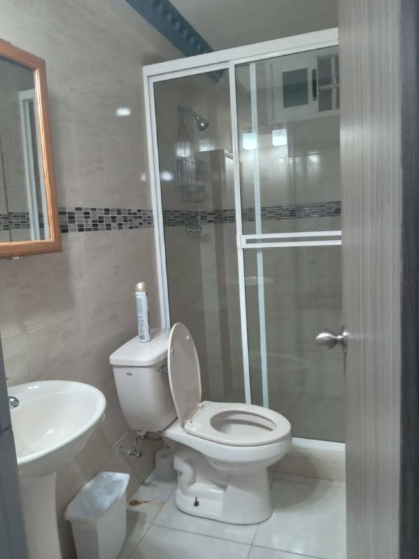 Contemporary bathroom with glass shower tiled walls granite vanity for rent Altos de Santa Maria Panama