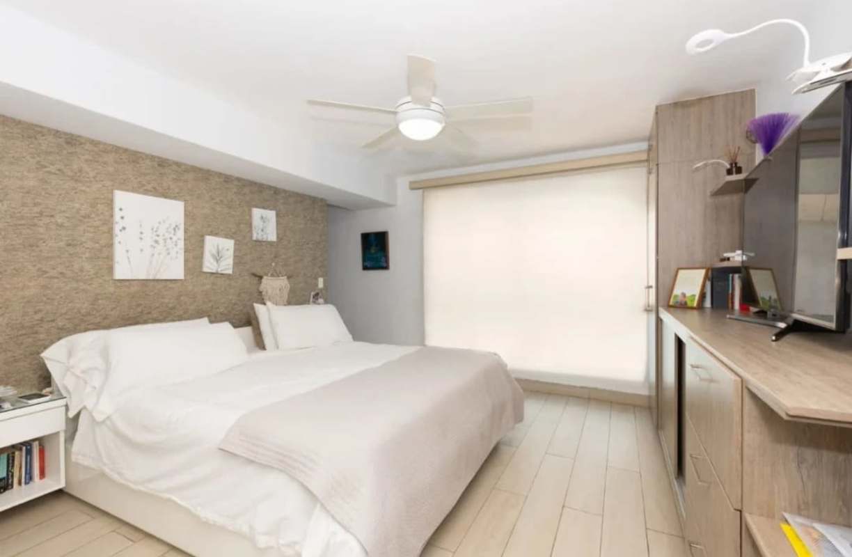 Spacious master bedroom with city skyline view and ocean view PH Blue Park Bella Vista Panama