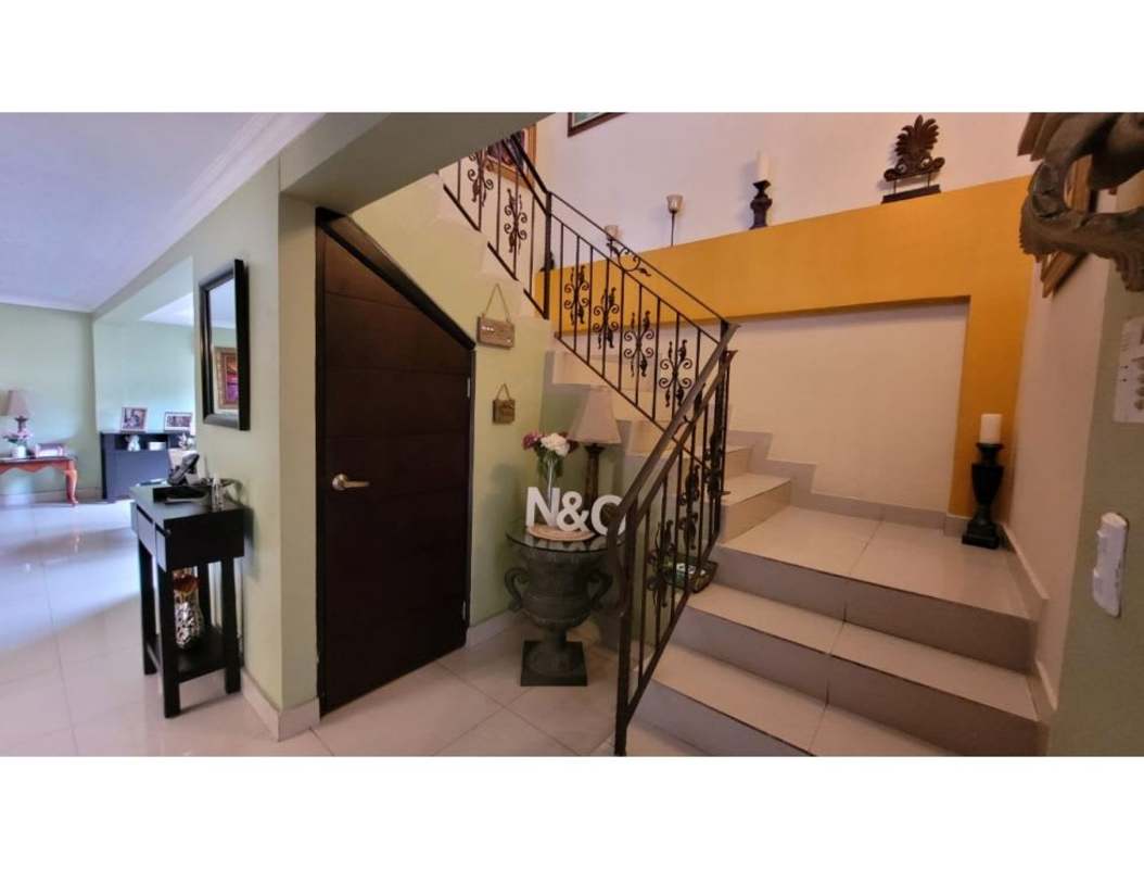 Traditional kitchen with blue dining set colorful valances Altos del Golf Panama