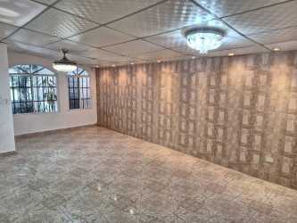 Spacious kitchen with granite counters wooden cabinets in Fundavico Arraiján Panama