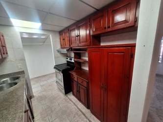 Spacious bedroom with built-in wardrobe, tiled floor Fundavico community Arraiján