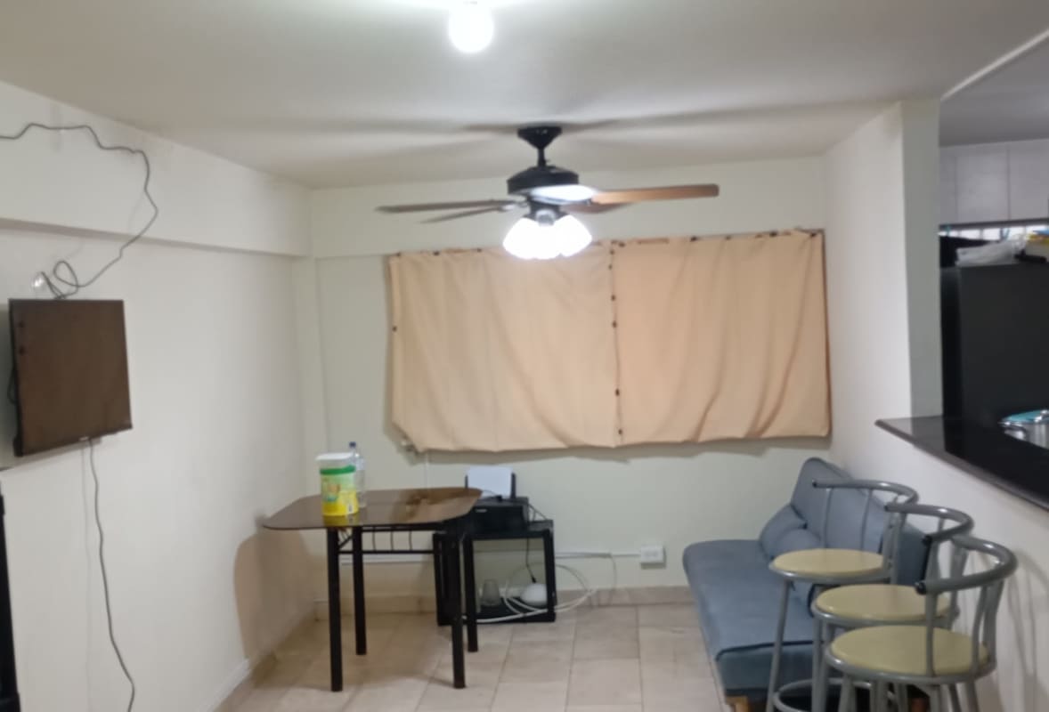 Small minimalist bedroom with bed, curtains and tiled floor in PH Prosperidad La Locería Panama City