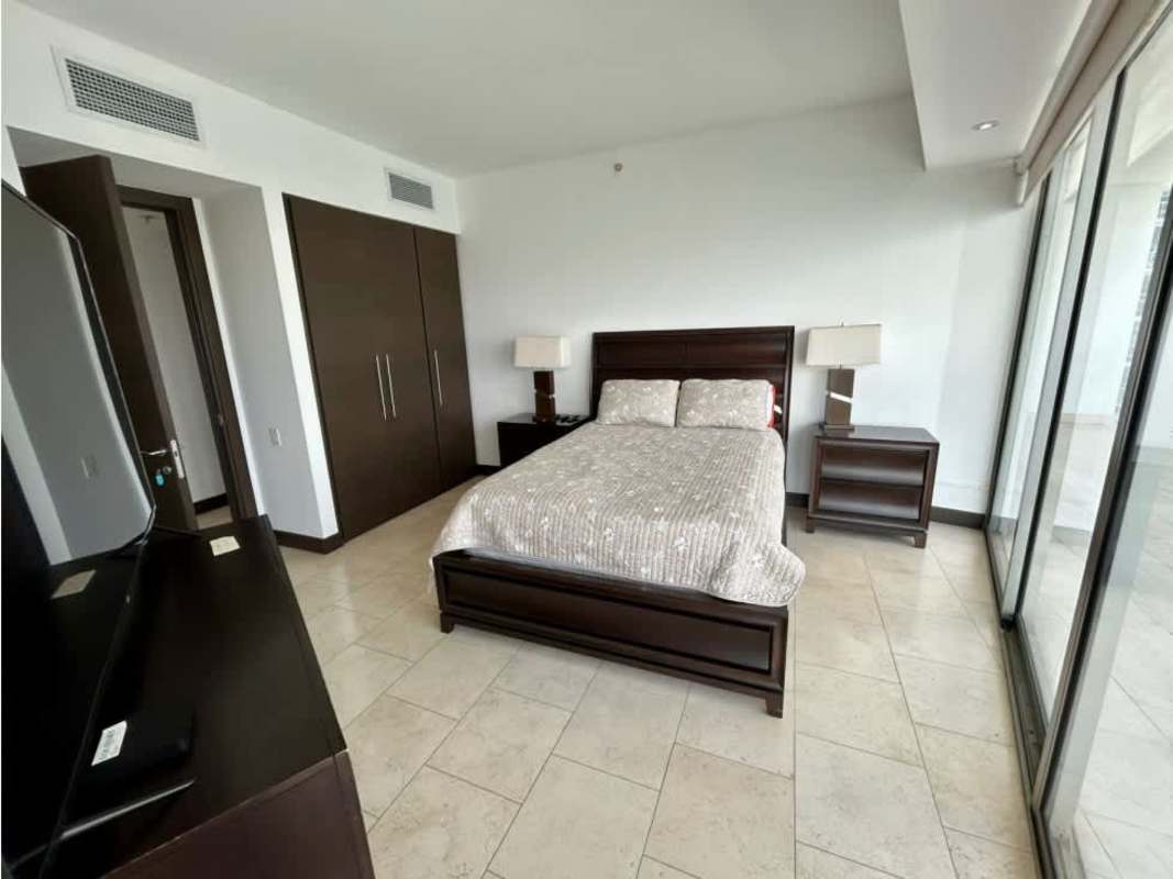 Modern open kitchen with marble countertops and built-in appliances in PH TOC Punta Pacifica Panama