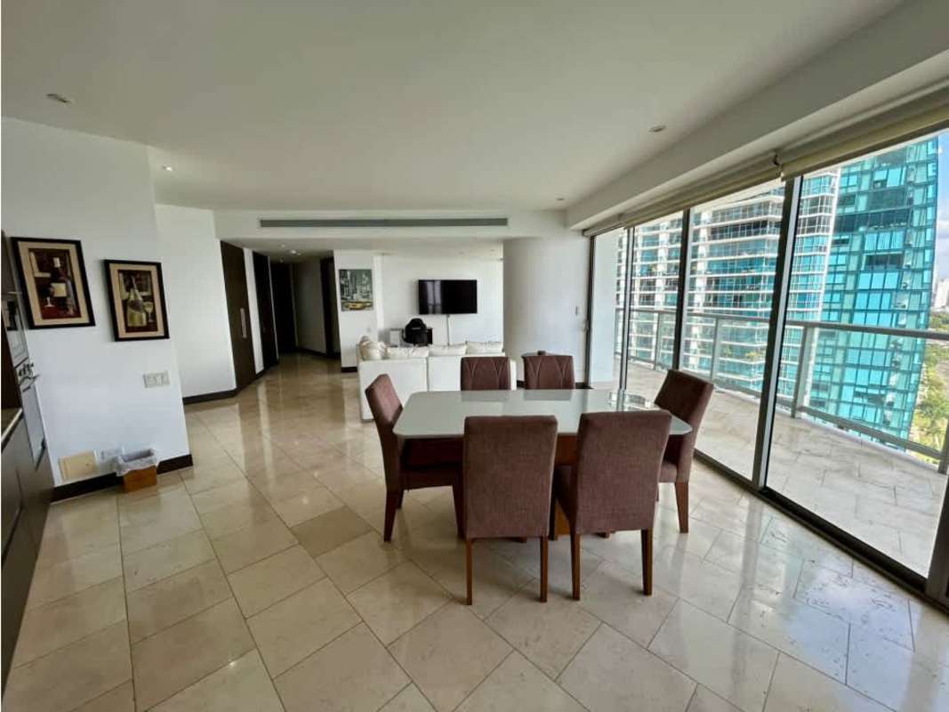 Open plan dining and living room with ocean views in PH TOC Punta Pacifica