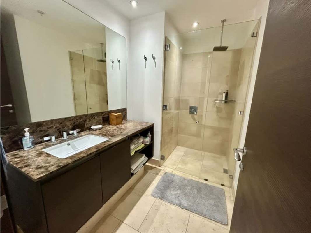 Modern bathroom with glass shower and double sink vanity in PH TOC Punta Pacifica Panama