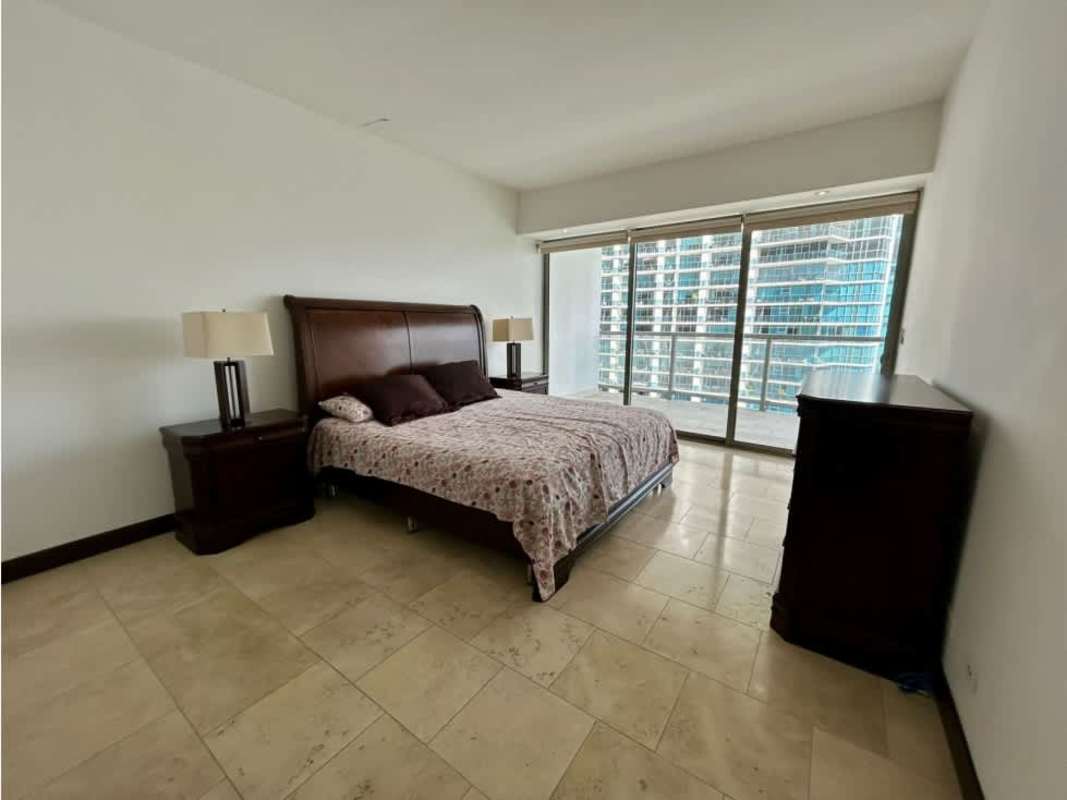 Bedroom featuring large window walls and city views in PH TOC Panama