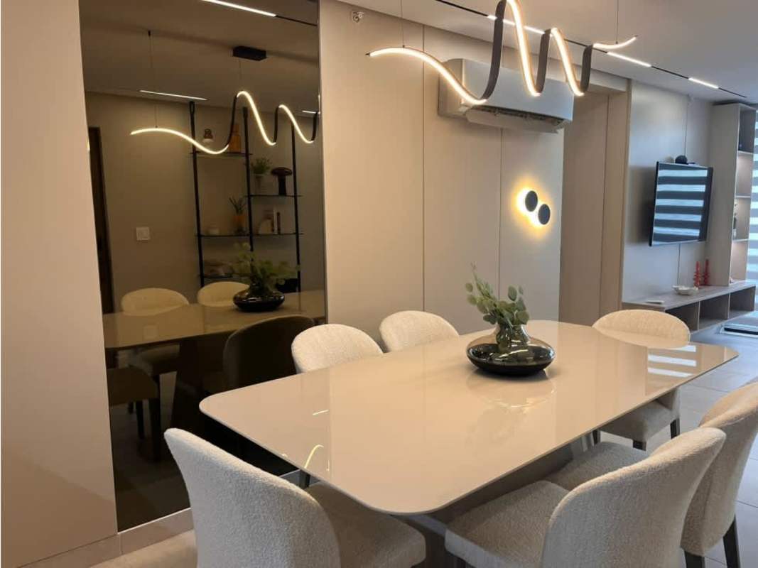 Living room in apartment Condado Country Club with large balcony access and natural light in Panama City