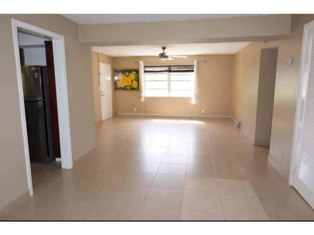 Spacious living dining room with sliding glass door to balcony, tile floor in PH Residencial Clayton Panama