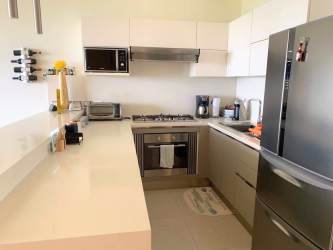 Coastal style open living area with modern furnishings Ibiza Beach Santa Clara