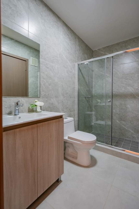 New semi-open kitchen with quartz counters in Condado Gardens apartment Panama City