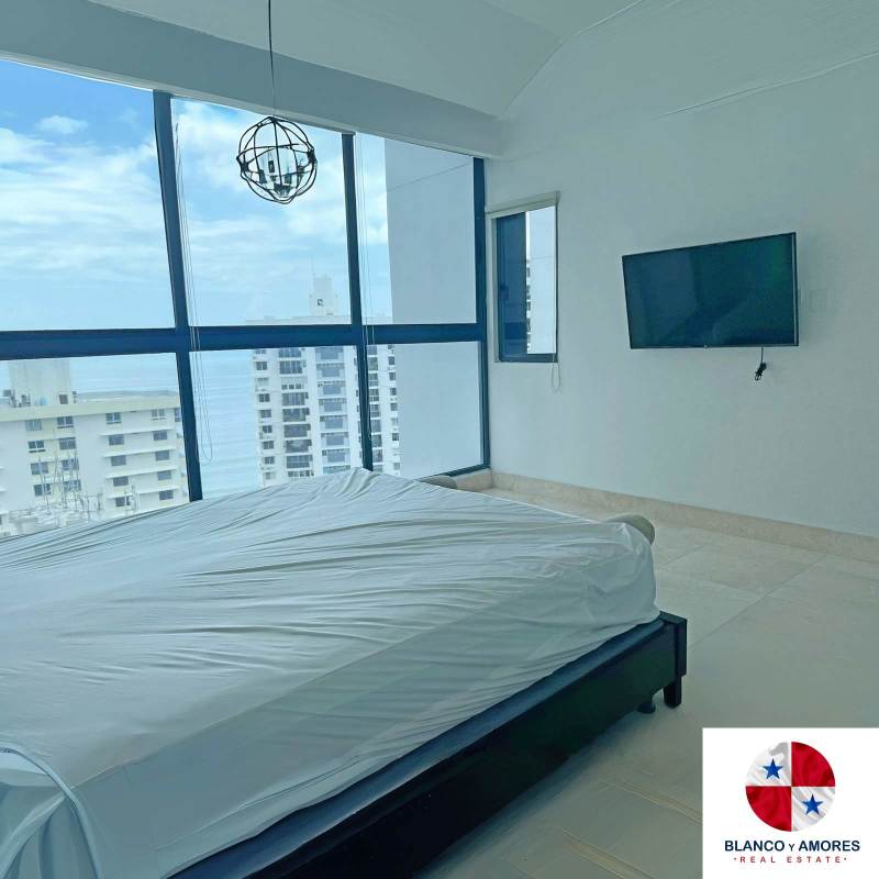 Furnished master bedroom with panoramic ocean view in PH Punta Paitilla Tower Panama City