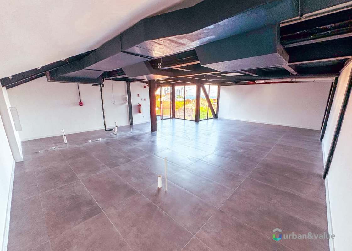 Glass enclosed rooftop walkway with panoramic city skyline views Casco Viejo Panama