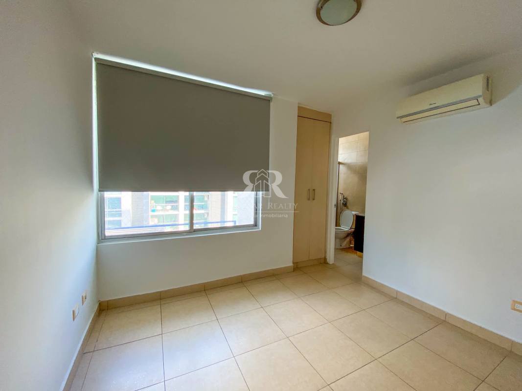 Bedroom with large windows, closet and AC unit in PH Costa View Panama City