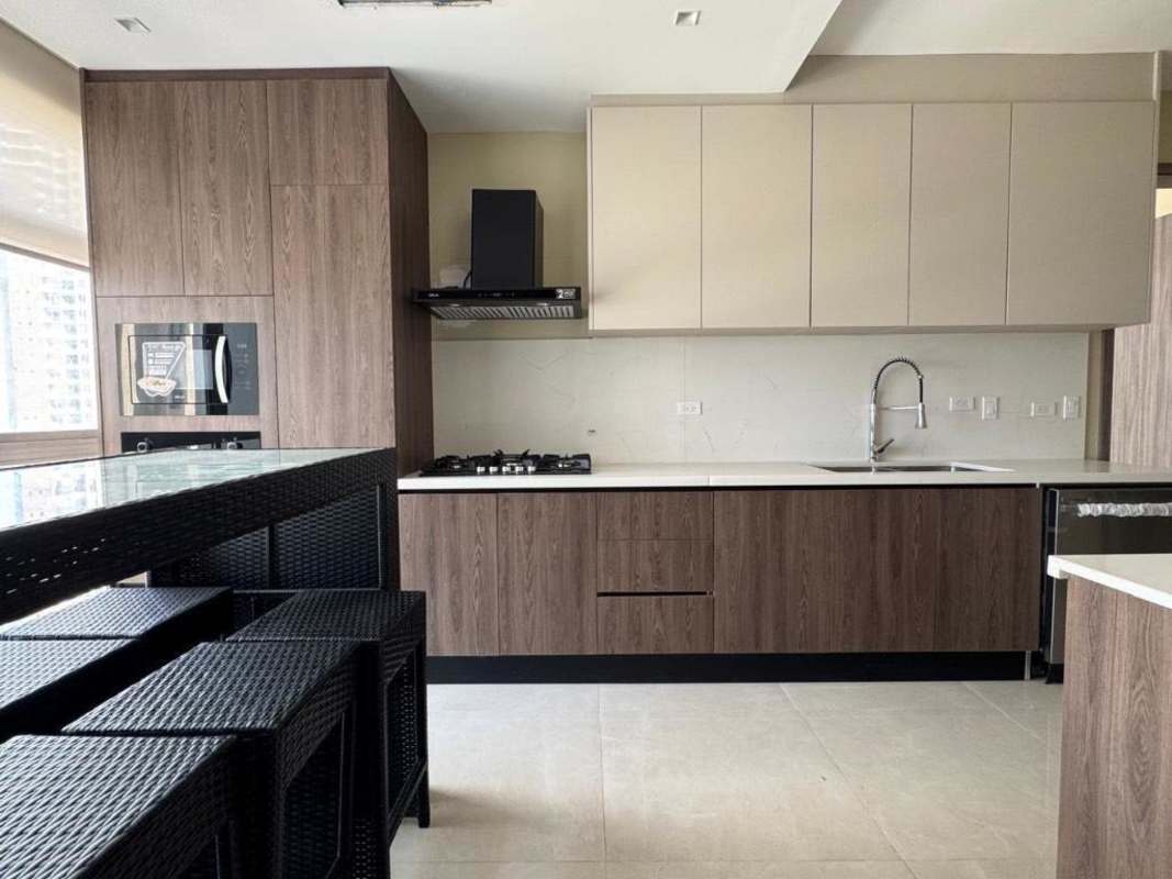 Fully remodeled kitchen with granite countertops and new appliances at PH Q Tower Panama
