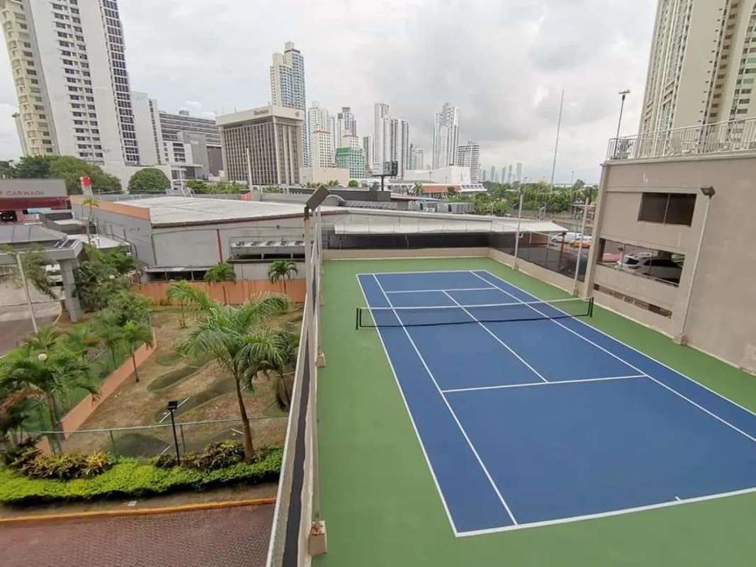 Living room with AC, panoramic windows overlooking Panama city skyline PH San Francisco Bay