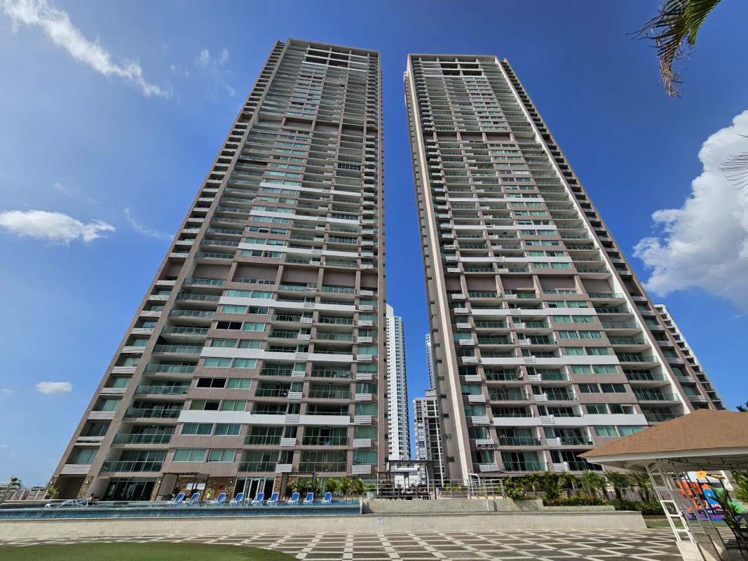 Large bright living and dining area with sliding doors to balcony at PH Sevilla Tower Costa del Este Panama