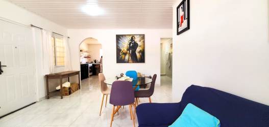 Kitchen with granite counters, window, appliances for sale Pedasí home