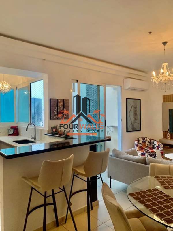 Modern living room with access to ocean view balcony in PH Vista del Mar Panama City