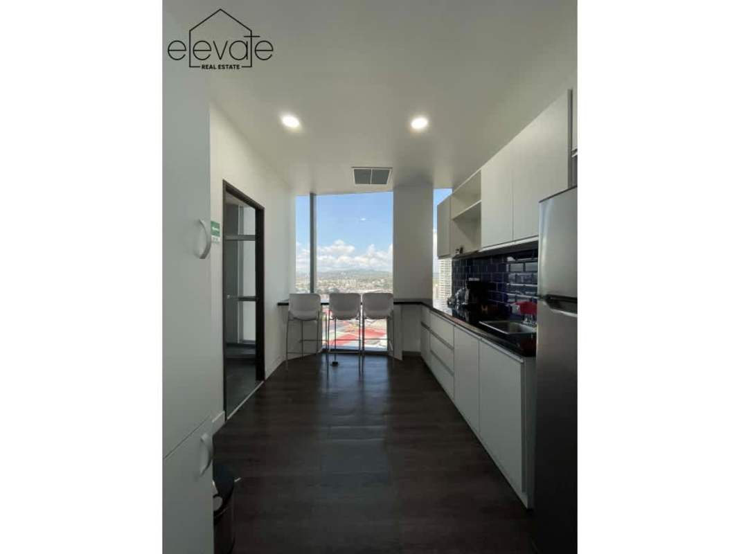 Modern kitchenette with cabinetry in Financial Park Tower Costa del Este office rental