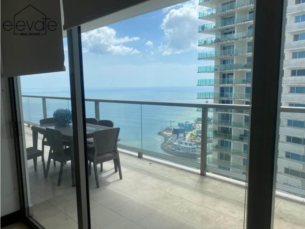 Living dining area opening to ocean view balcony Ocean Club luxury apartment for rent Panama City