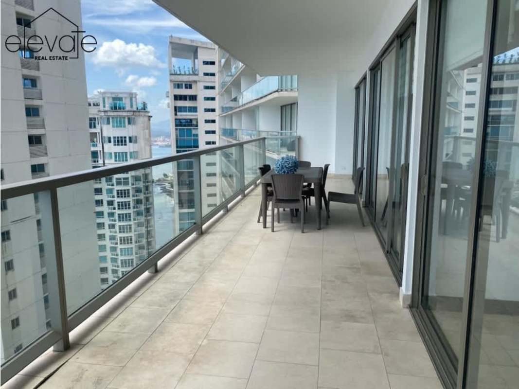 Spacious living room with panoramic ocean and city views in Ocean Club apartment for rent Punta Pacifica Panama