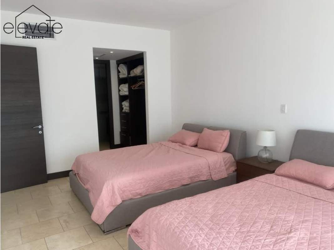 Bedroom with tile floors, built-in closet and natural light in Ocean Club apartment Punta Pacifica