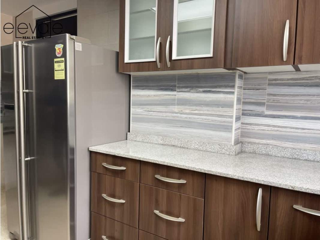 Updated kitchen with granite countertops, new cabinets, frosted window PH Entremares Panama