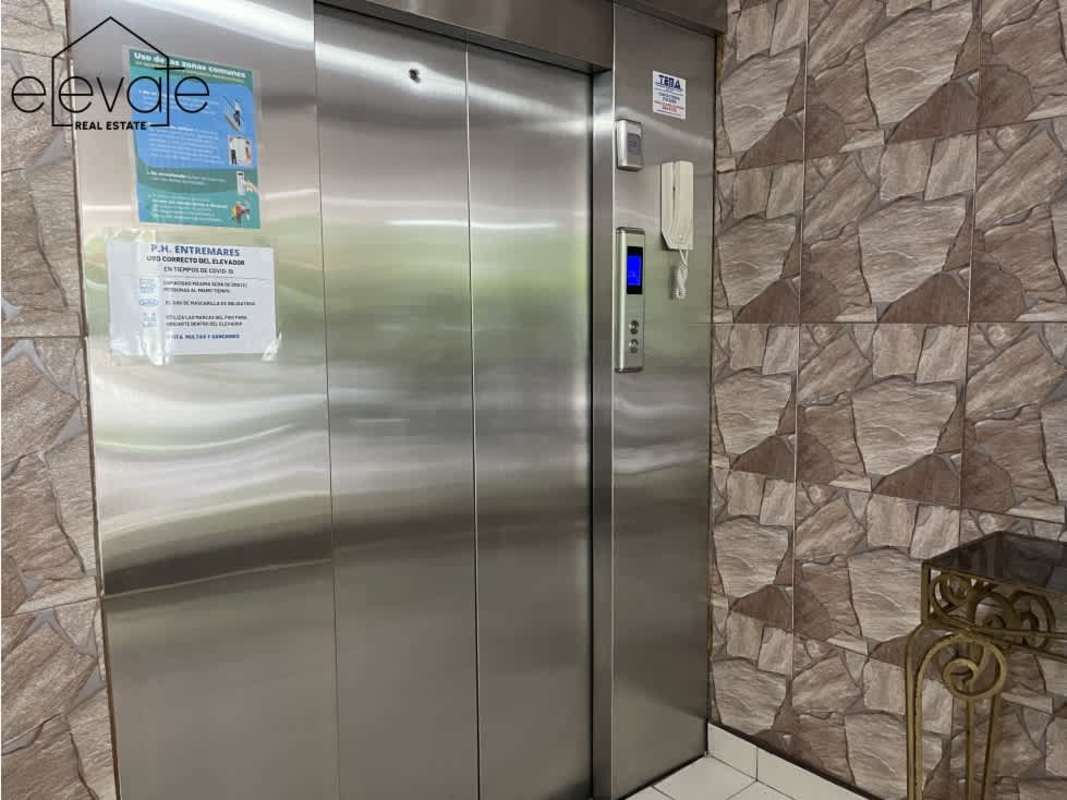 Bedroom with built-in closet, split AC, and modern lighting PH Entremares El Cangrejo Panama