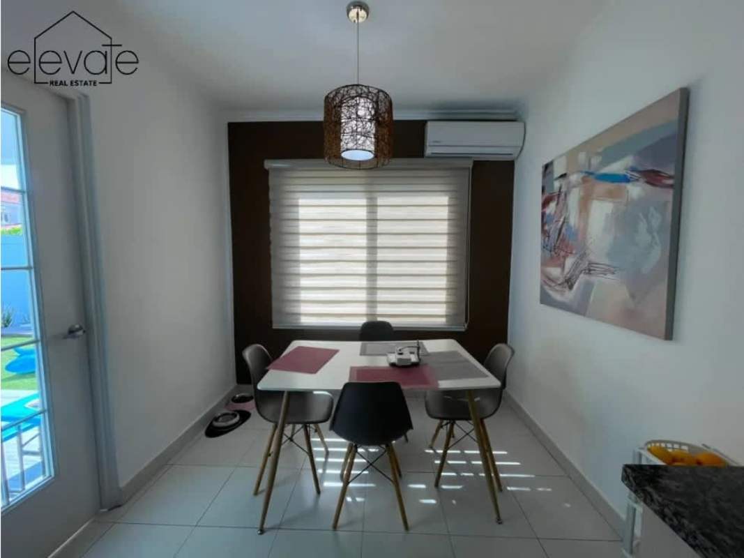 Backyard with private swim pool, sun deck and covered patio in Costa Sur Panama house for sale