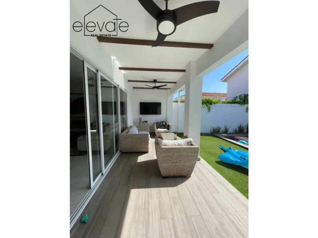 Spacious living room with sliding glass to terrace and private pool home in Costa Sur Panama