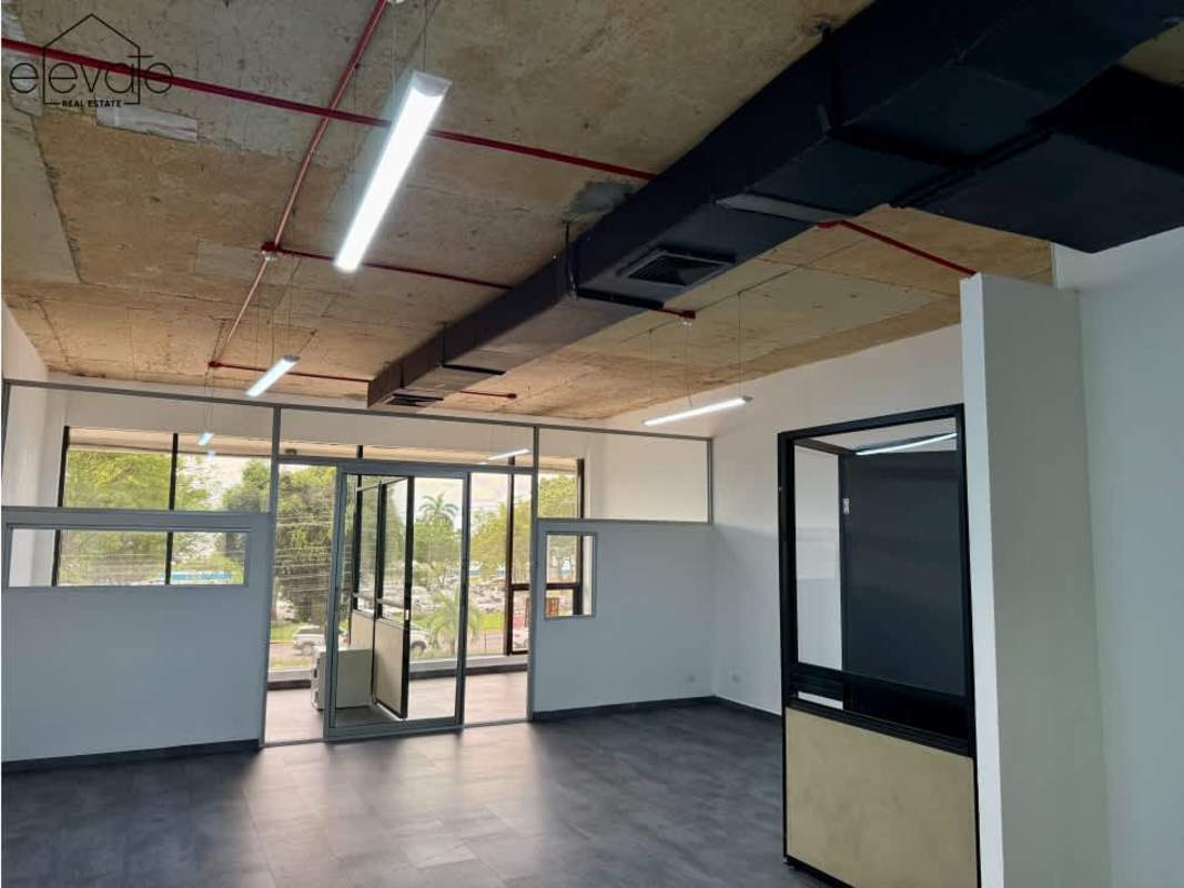 Modern open workspace with industrial ceilings at commercial office Galería Balboa Panama