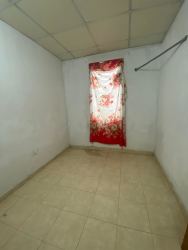 Small empty bedroom with tiled floor and window covered by curtain, Vacamonte Arraiján